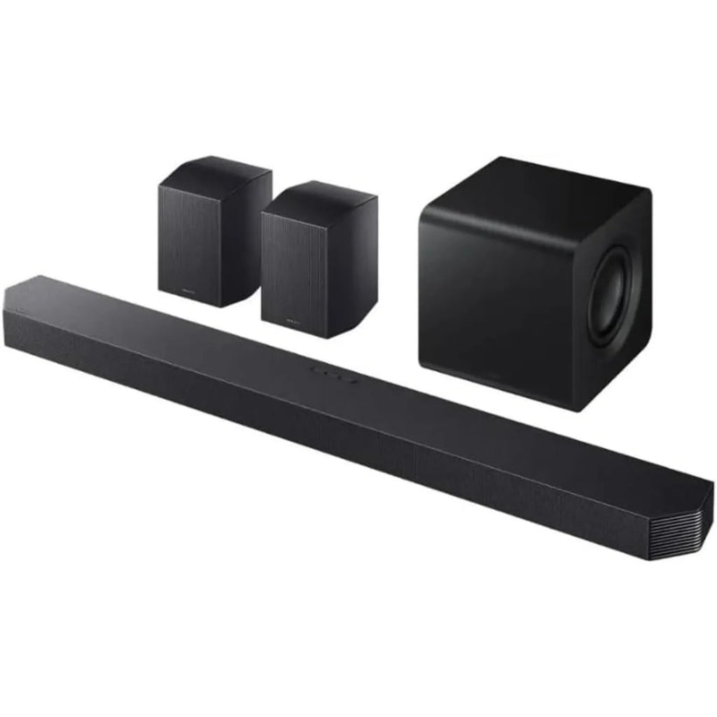 Barra de sonido negra con subwoofer y dos altavoces traseros, vista en ángulo.