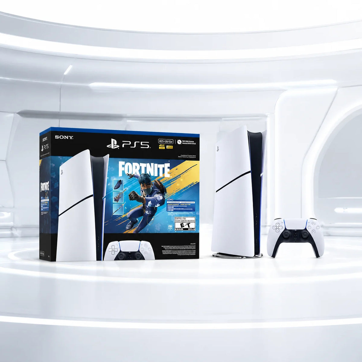 Consola PS5 Digital Edition blanca con mando y caja del paquete Fortnite