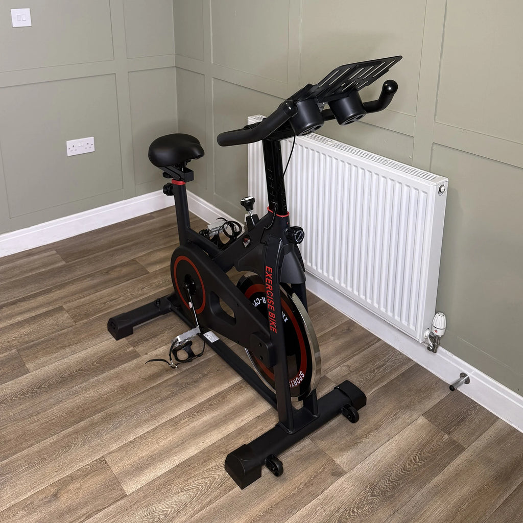 Bicicleta de ejercicio, bicicleta estacionaria con volante de inercia de 8 kg, máquina de ciclismo indoor con resistencia ajustable, asiento y manillar.