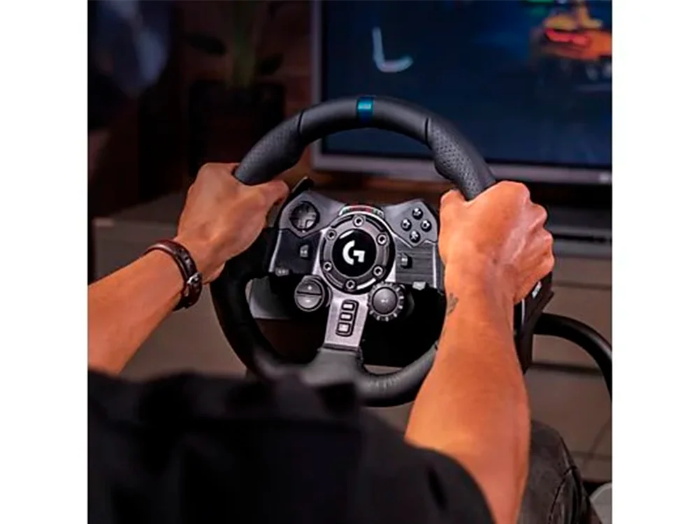 Logitech G29 SE Driving Force Steering Wheel + Shifter for PS5/PS4/PS3/PC, featuring TRUEFORCE technology, leather and aluminum construction, 6-speed H-pattern shifter, and progressive brake pedal for ultimate racing simulati