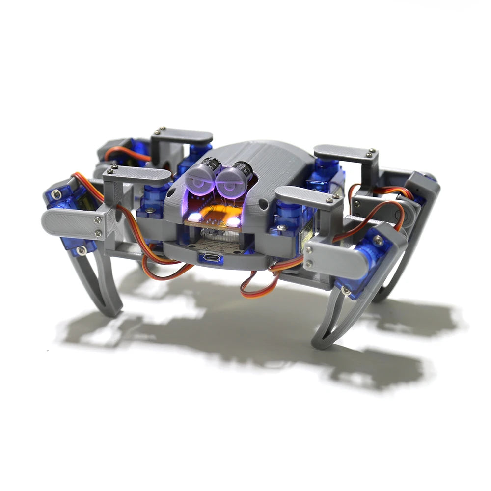 Kit de robot araña con cuerpo gris, patas articuladas y sensores en la placa central