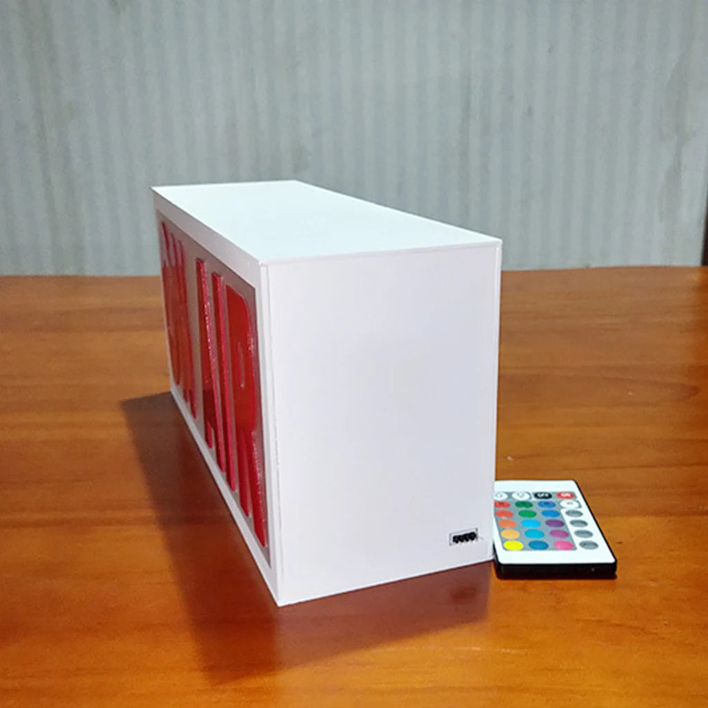 Letrero LED tipo neón “ON AIR” caja blanca con luz roja y control remoto multicolor.