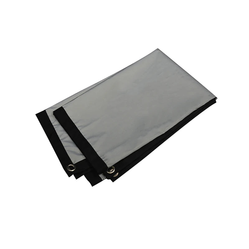 Pantalla anti-luz plegable gris con bordes negros y cintas de sujeción