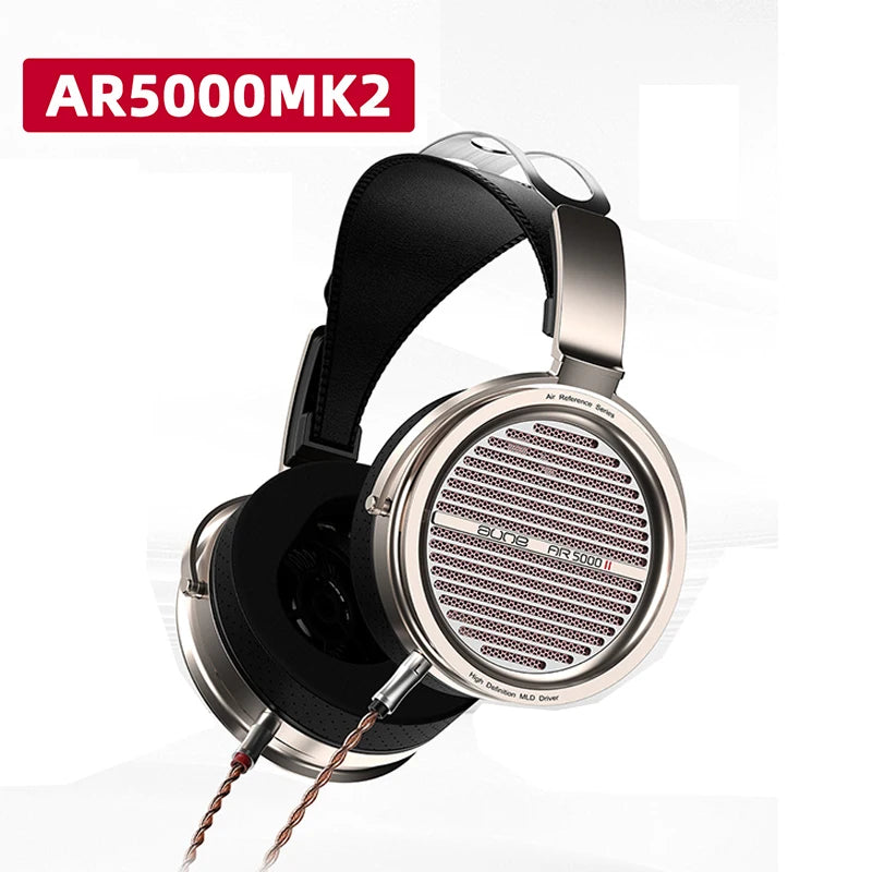 Auriculares HiFi abiertos con copas negras y diadema metálica plateada, vista lateral