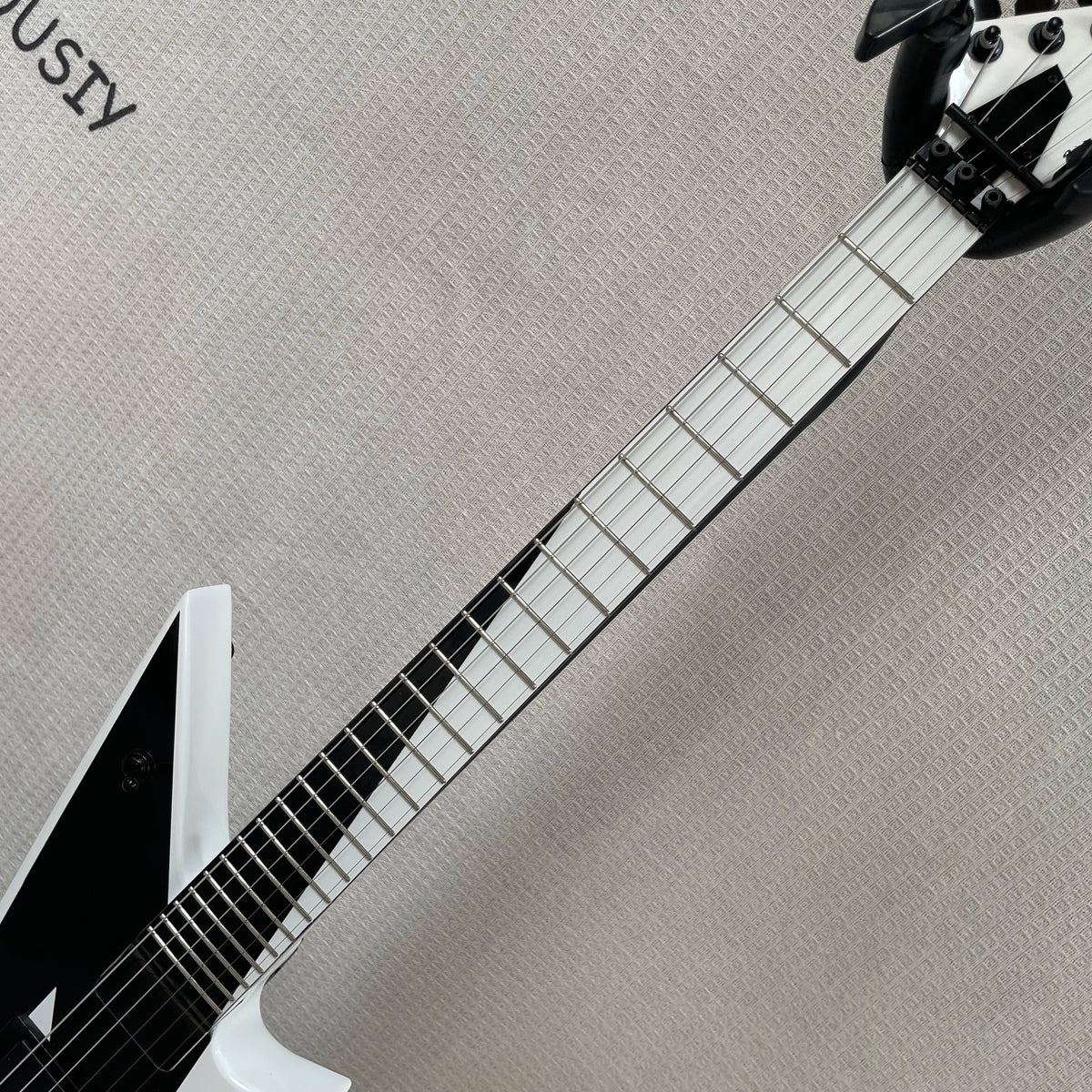 Guitarra eléctrica de 6 cuerdas con acabado en contraste blanco y negro, sistema de trémolo, guitarra con perillas de volumen dobles, una guitarra de estilo único