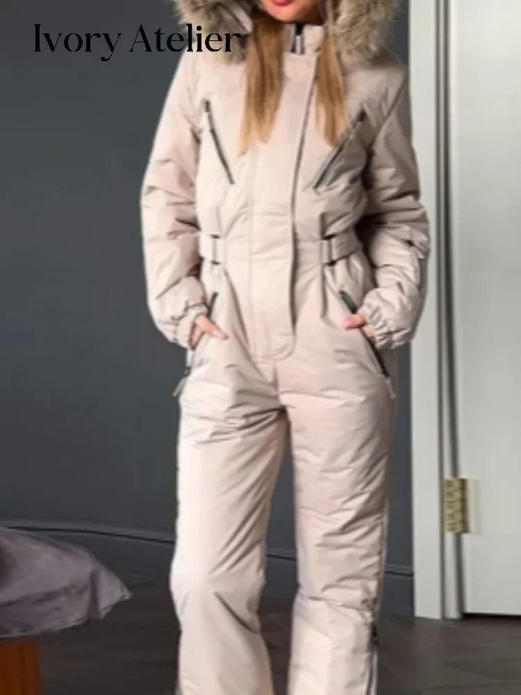 Traje de esquí con capucha y detalles de piel, cuello alto, resistente al viento, con cremallera y cinturón, mono de snowboard para mujer, ropa de esquí nueva para 2026.