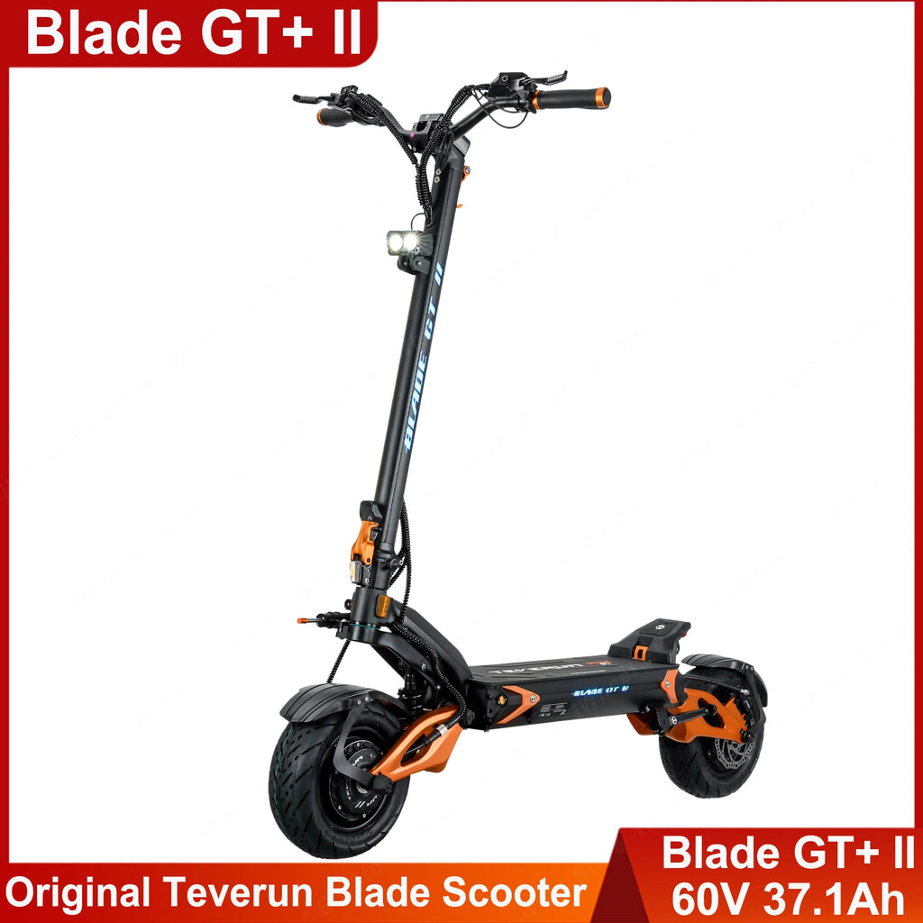 Patinete eléctrico plegable negro con detalles naranjas y luces delanteras