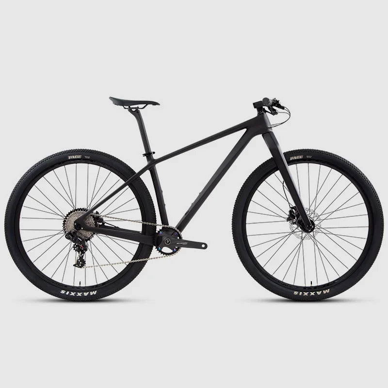 Bicicleta de montaña de 29 pulgadas con cuadro de fibra de carbono, horquilla de aleación de aluminio de alta calidad, 24 velocidades y frenos de disco hidráulicos comunes