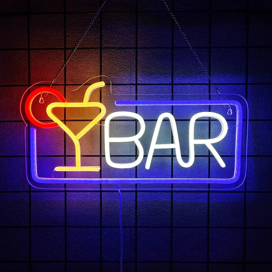 Letrero neón Y BAR con copa roja y corazón amarillo, letras blancas