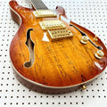 Guitarra eléctrica de media cavidad con diseño de orificio en forma de F. La madera se seca y se somete a un tratamiento especial. Chapa de arce. Envío gratuito.