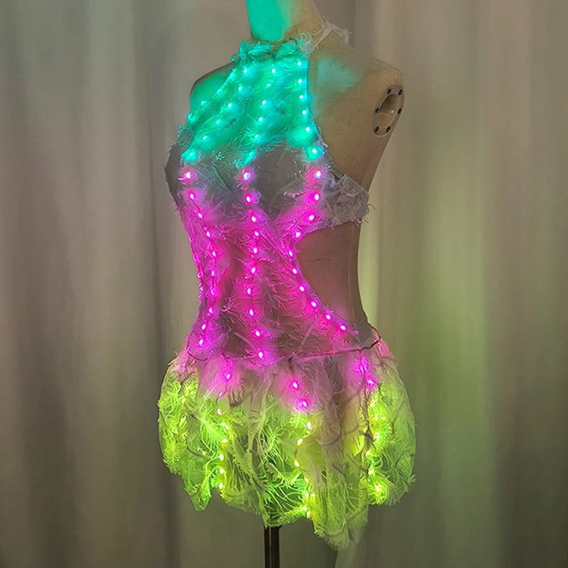 Vestido de encaje con plumas y luces LED de colores para mujer, vestido luminoso para discotecas, bares, piscinas, bailes y actuaciones.