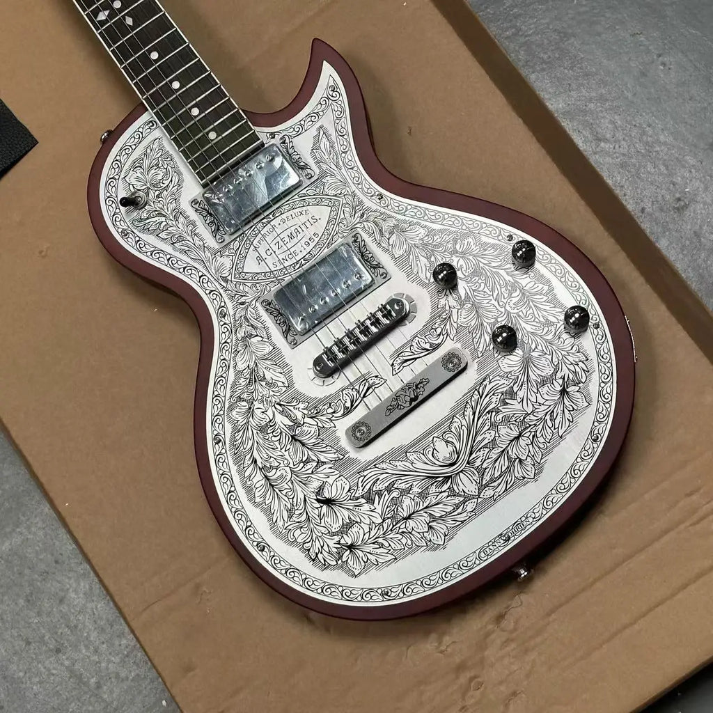 Guitarra eléctrica de duraluminio tallada a mano con grabado floral en espiral, ribete rojo marrón, humbuckers HH, puente fijo y mástil de palisandro especial I