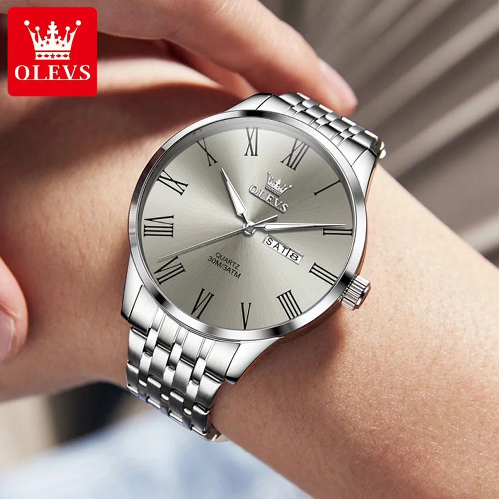 Reloj de cuarzo para hombre marca OLEVS, original y sencillo, resistente al agua, de acero inoxidable, con fecha, manecillas luminosas y números romanos.