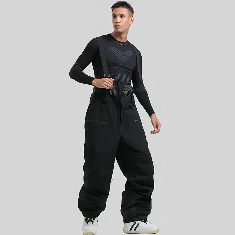 Nuevos pantalones de esquí para hombre, monos de esquí cálidos y gruesos para exteriores, pantalones de snowboard holgados impermeables a prueba de viento para nieve