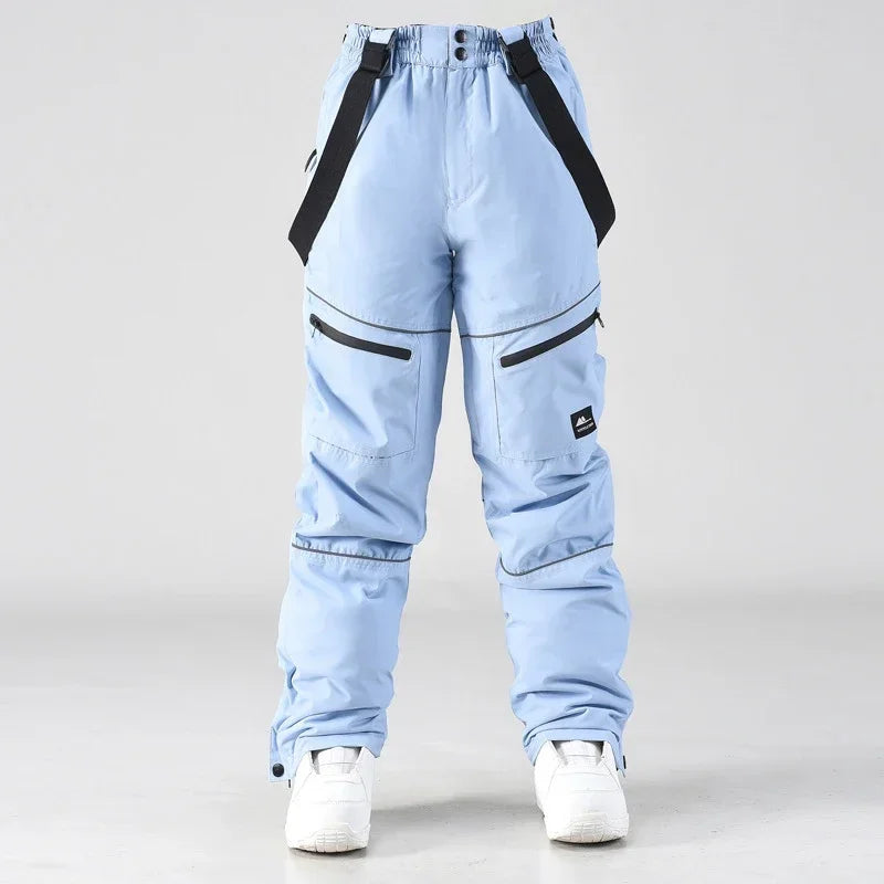2024 deporte al aire libre hombre pantalones de esquí a prueba de viento mujeres pantalones de nieve montaña algodón Snowboard monos femeninos ropa impermeable