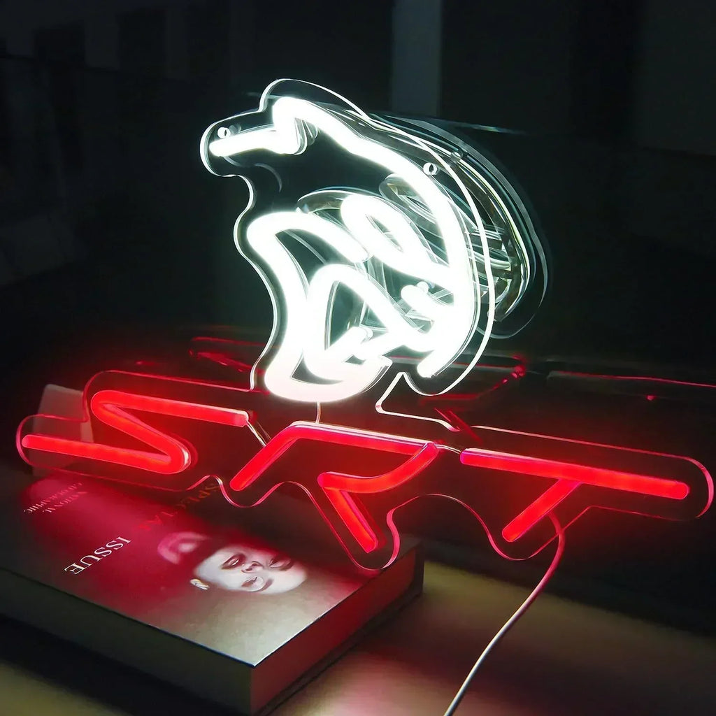 Letrero de neón con figura y texto, luces roja y verde