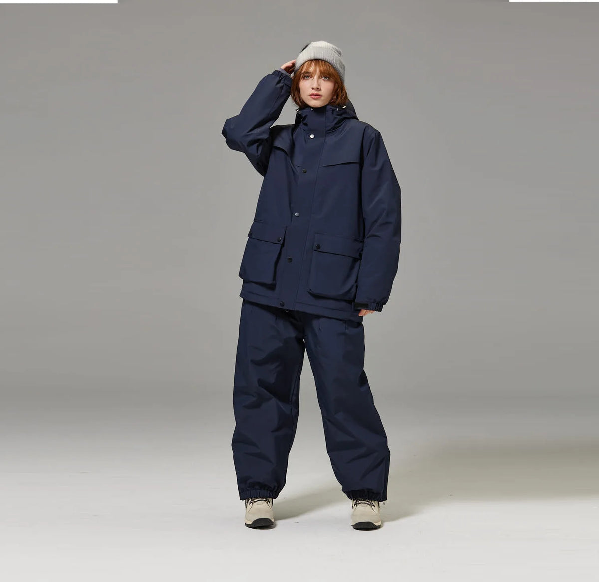 Mismos trajes de esquí de color sólido para hombres y mujeres, esquí de doble tabla y snowboard, versión súper suelta y de engorde al aire libre