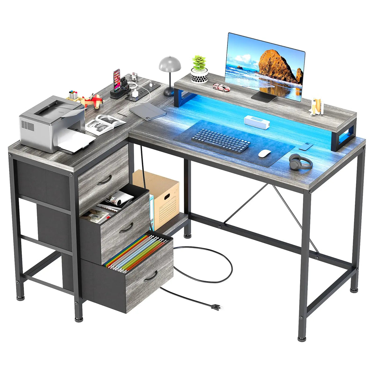 Escritorio gaming en L gris con cajones, repisa y luz LED azul en la superficie
