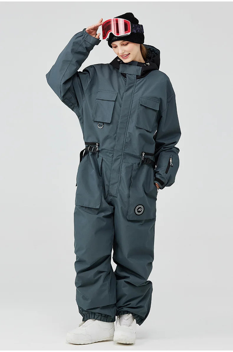 Mono de esquí unisex de alta calidad para invierno, traje de una sola pieza, resistente al viento, impermeable y cálido, para hombres y mujeres, ideal para actividades al aire libre en la nieve.