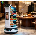 Robot autónomo de reparto de comida con pantalla y bandejas apiladas