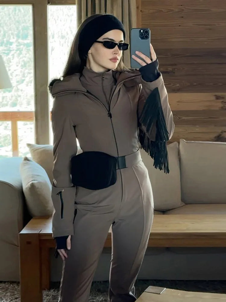 Mono de esquí liso con capucha y flecos, manga larga, cinturón en la cintura, resistente al agua, ropa de abrigo de invierno para mujer, traje de nieve a la moda 2025