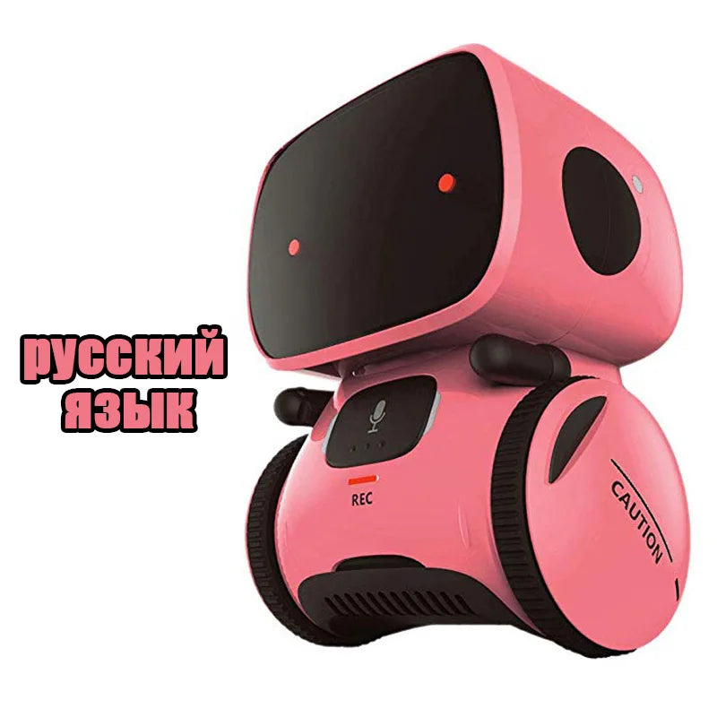 Robot educativo rosa en vista frontal, pantalla oscura y ruedas negras
