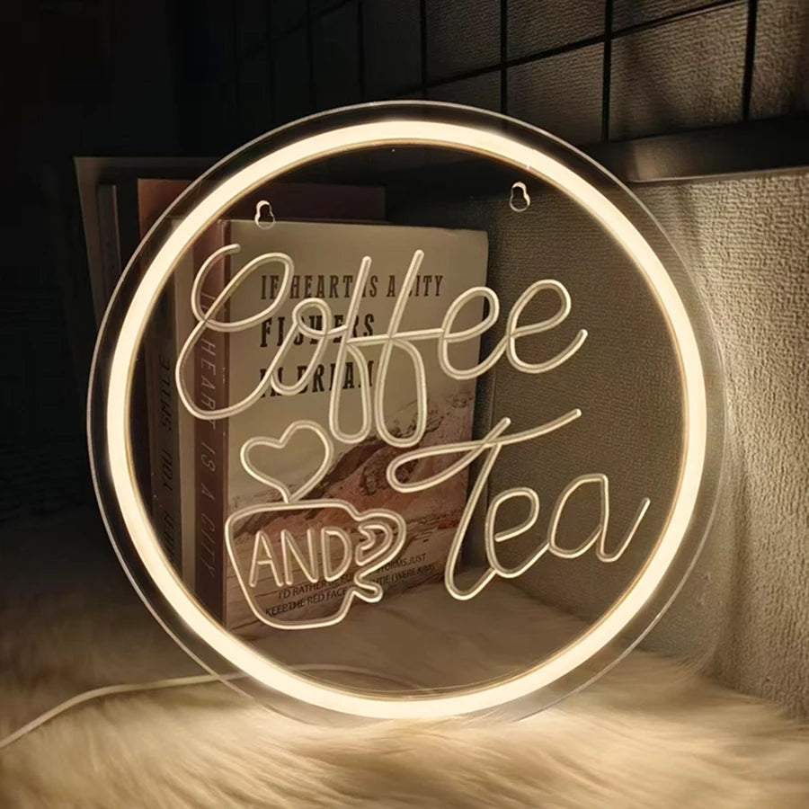 Letrero neón LED redondo “Coffee AND Tea” con corazones y taza, luz cálida.