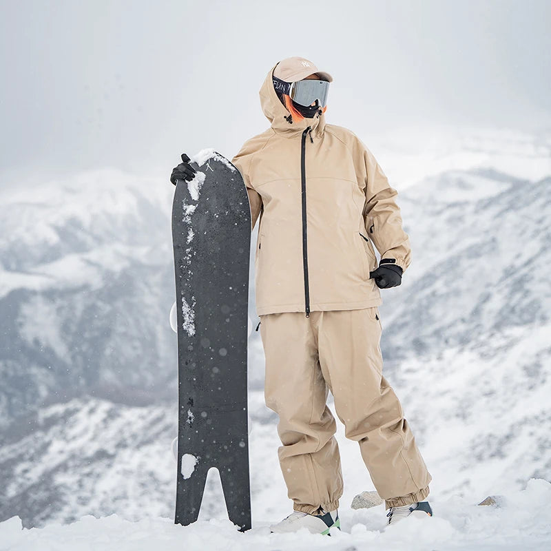 Nuevo traje de esquí de Color sólido para parejas de invierno, Snowboard para hombres, ropa deportiva informal impermeable a prueba de viento para mujeres, ropa deportiva cálida y transpirable