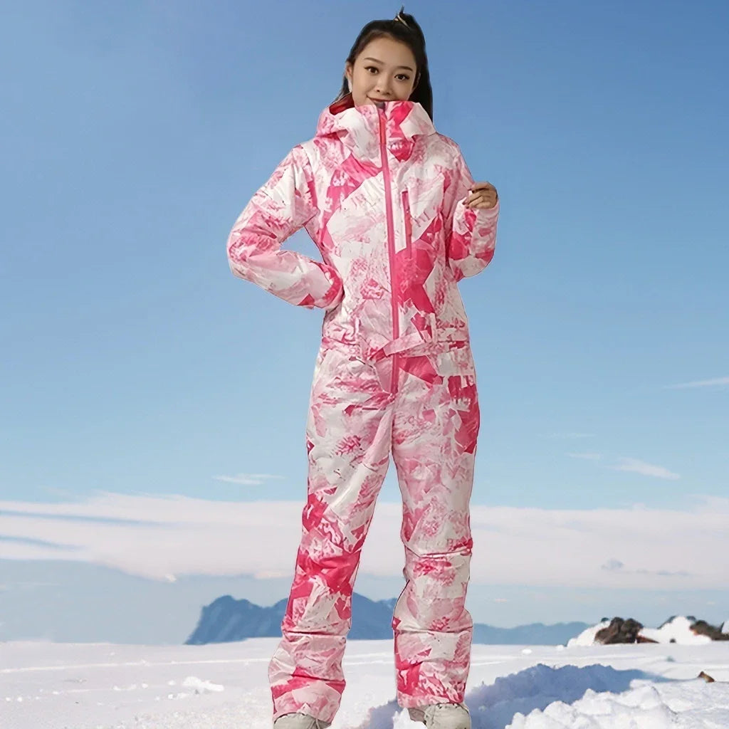 Trajes de esquí de una pieza para mujer, monos deportivos de invierno, traje de Snowboard impermeable, mono de nieve para mujer, ropa de esquí cálida con capucha, 2025