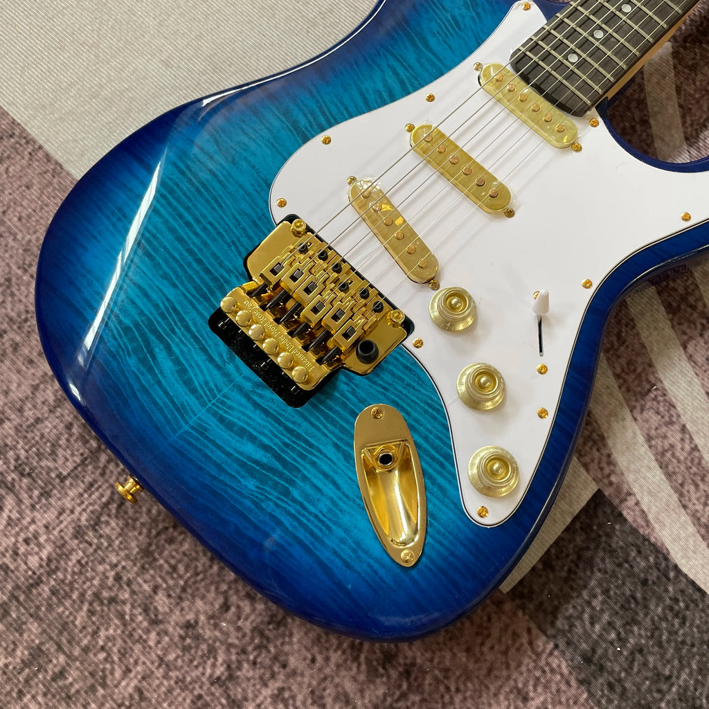 Guitarra Eléctrica Azul ST con Herrajes Dorados, Barra de Trémolo, Diapasón de Palisandro, Envío Rápido