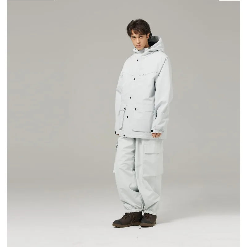 Mismos trajes de esquí de color sólido para hombres y mujeres, esquí de doble tabla y snowboard, versión súper suelta y de engorde al aire libre