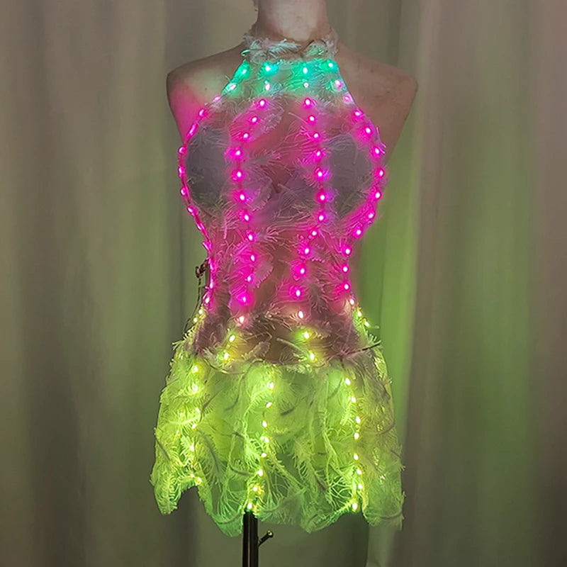 Vestido de encaje con plumas y luces LED de colores para mujer, vestido luminoso para discotecas, bares, piscinas, bailes y actuaciones.