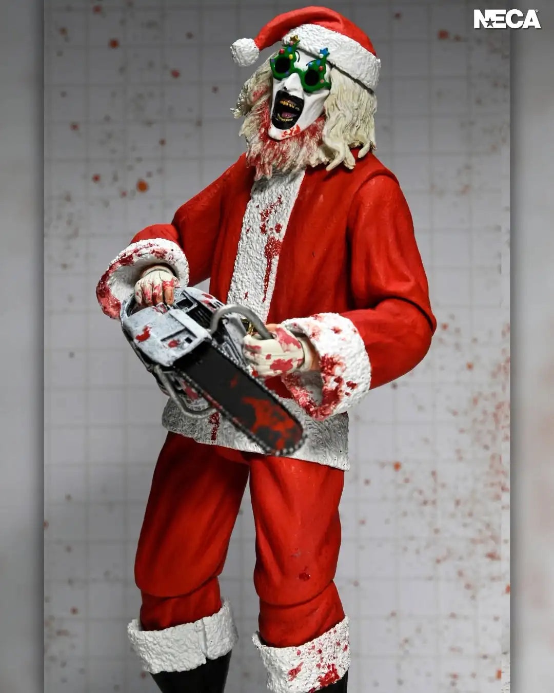 NECA Toys Terrifier 3 - Ultimate Bloody Santa Suit Art the Clown Figura de Acción a Escala 7 Pulgadas Modelo Muñeco Kit de Garaje