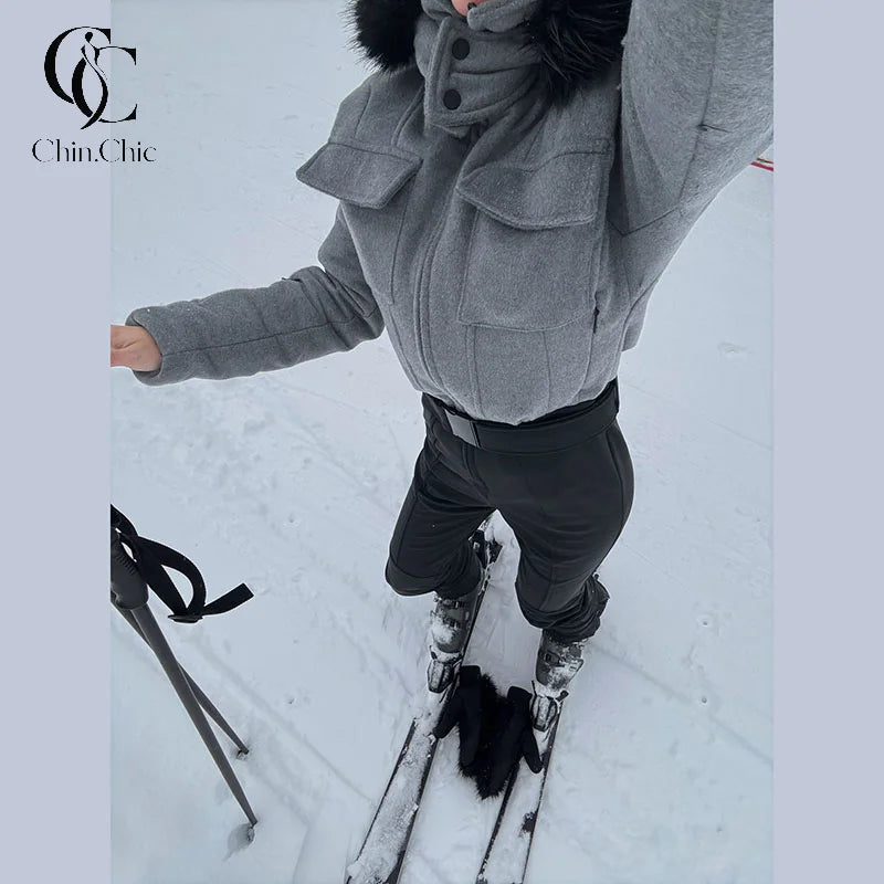 Traje de esquí de una pieza para mujer, con capucha y detalles de piel sintética, cinturón, corte ajustado, resistente al viento, ideal para esquí de invierno, snowboard y actividades al aire libre.