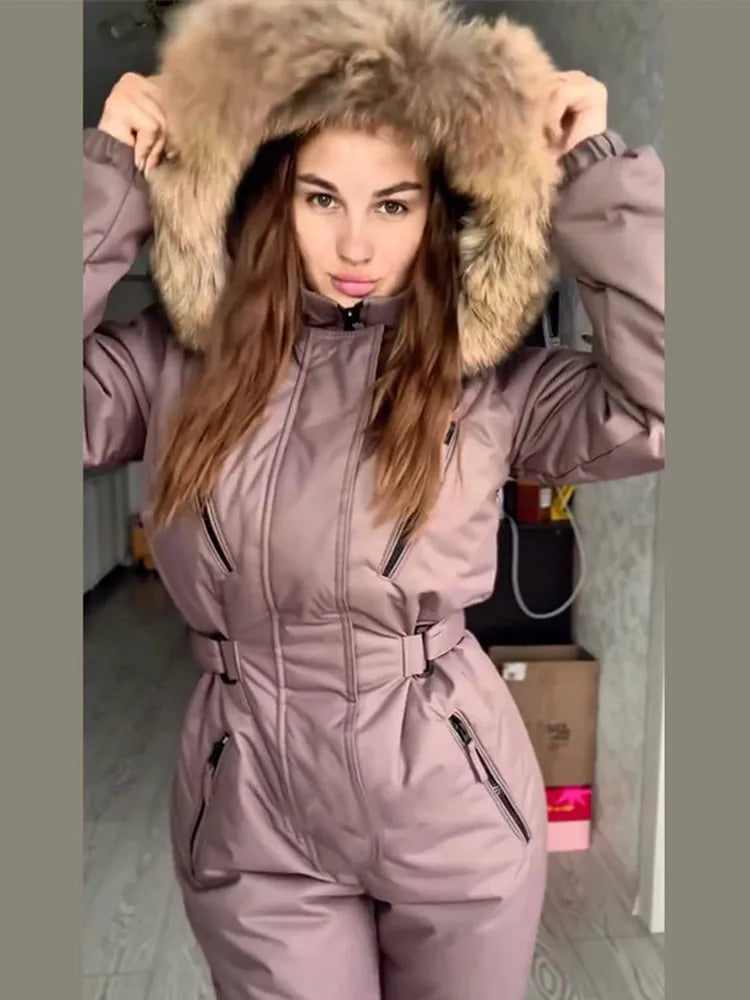 Elegante mono de esquí para mujer con capucha de piel, cremalleras gruesas y cintura ajustable, mono de esquí cálido para mujer, otoño-invierno 2026, nuevo.