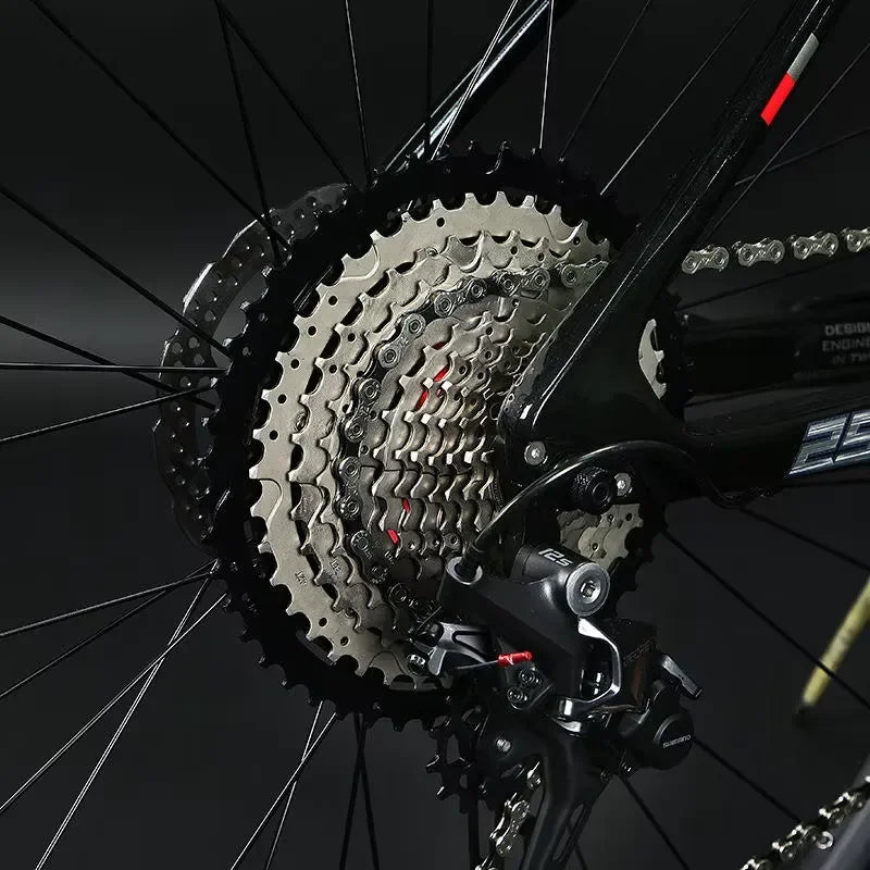 Bicicleta de montaña de 29 pulgadas con cuadro de fibra de carbono, horquilla de aleación de aluminio de alta calidad, 24 velocidades y frenos de disco hidráulicos comunes