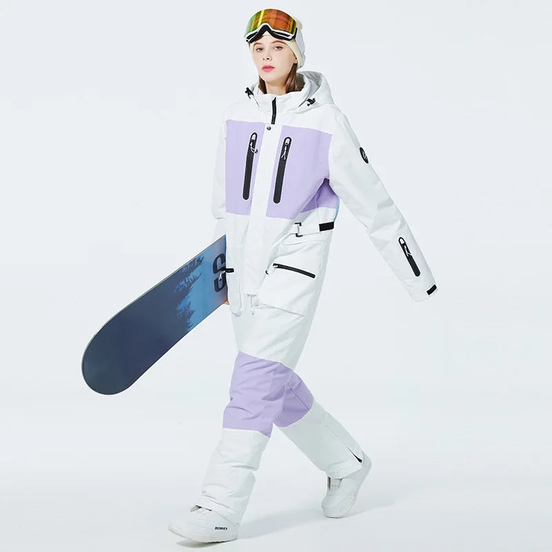 Nueva moda traje de esquí de una pieza hombres mujeres invierno a prueba de viento impermeable mono de esquí trajes de snowboard trajes de nieve femeninos