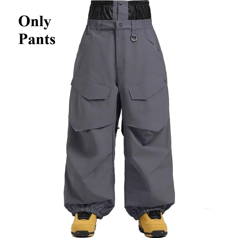 Pantalones de esquí holgados resistentes al desgaste para hombre, pantalones de invierno con bolsillos sueltos aislados para mujer, ropa impermeable para deportes al aire libre, cálida 2025