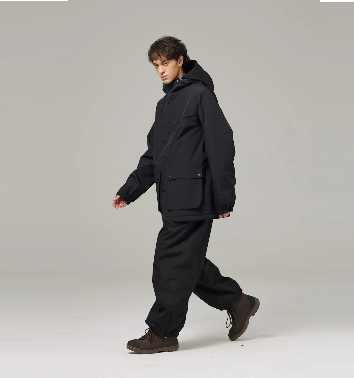 Mismos trajes de esquí de color sólido para hombres y mujeres, esquí de doble tabla y snowboard, versión súper suelta y de engorde al aire libre