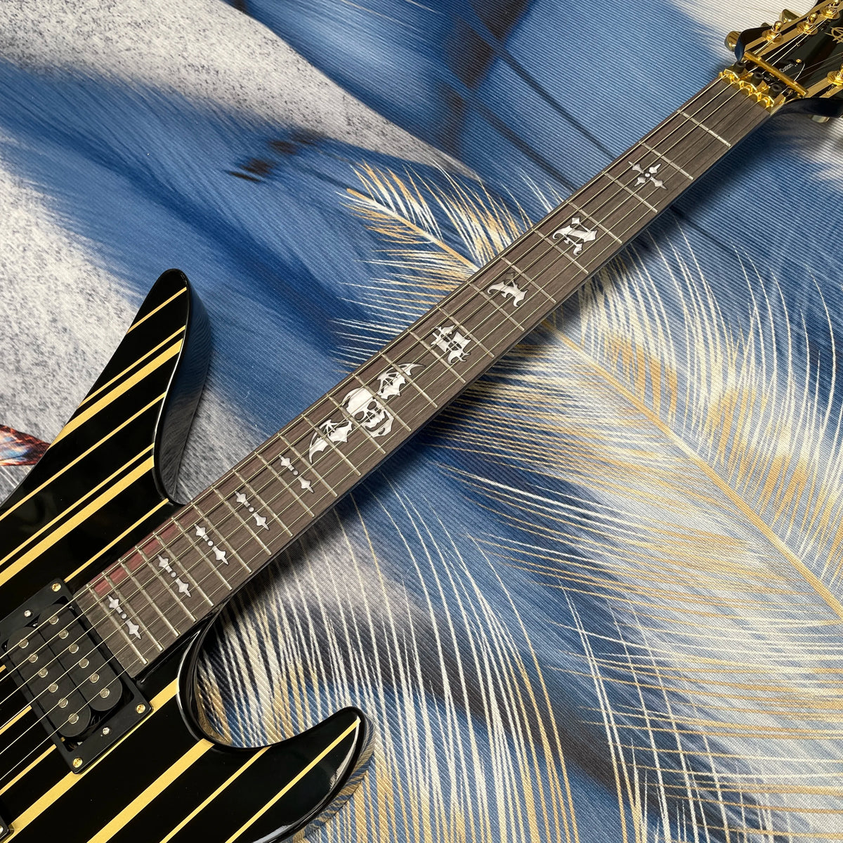 Guitarra eléctrica de 6 cuerdas con rayas negras y doradas, cuerpo de caoba con sonido rico, guitarra de heavy metal con doble bloqueo.