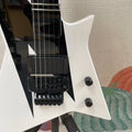 Guitarra eléctrica de 6 cuerdas con acabado en contraste blanco y negro, sistema de trémolo, guitarra con perillas de volumen dobles, una guitarra de estilo único