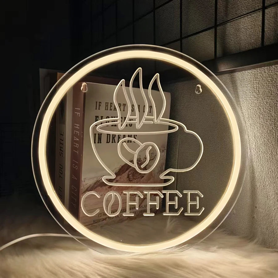 Letrero neón LED redondo con taza y texto “COFFEE”, estilo vintage, luz cálida.