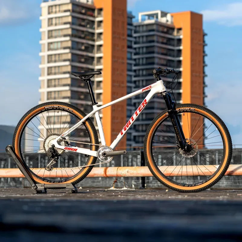 Bicicleta de montaña de 29 pulgadas con cuadro de fibra de carbono, horquilla de aleación de aluminio de alta calidad, 24 velocidades y frenos de disco hidráulicos comunes