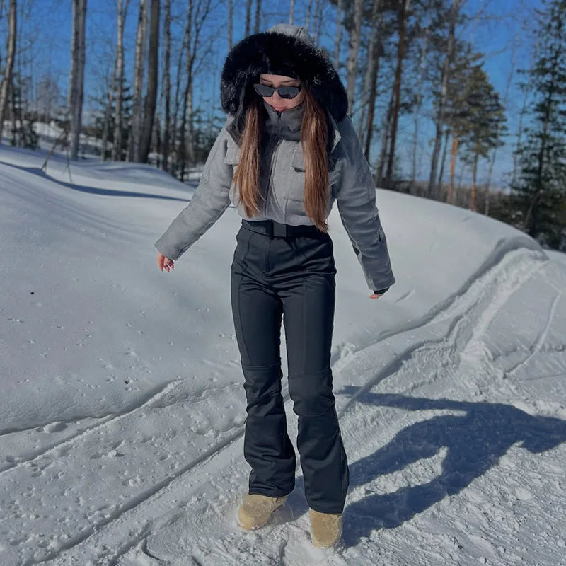 Traje de esquí de una pieza para mujer, con capucha y detalles de piel sintética, cinturón, corte ajustado, resistente al viento, ideal para esquí de invierno, snowboard y actividades al aire libre.