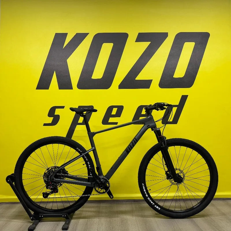 Bicicleta de montaña MTB de fibra de carbono Kozo, precio de fábrica, 29er para adultos, rígida, con frenos de disco hidráulicos de cuatro pistones
