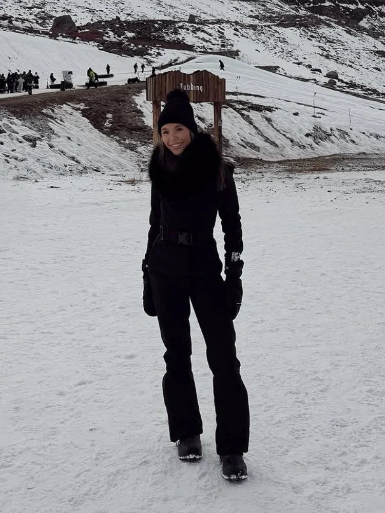Ropa de esquí negra elegante de manga larga con cuello levantado para mujer, mono ajustado de cintura alta con cintura alta, mono cálido para invierno 2026