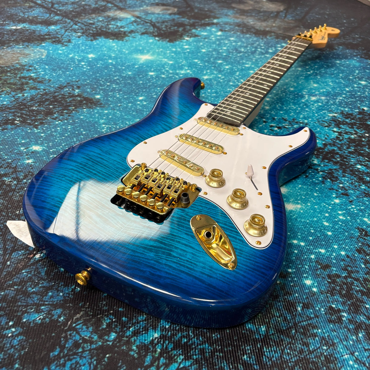 Guitarra eléctrica azul, guitarra con diapasón de palisandro, guitarra eléctrica con pastillas SSS