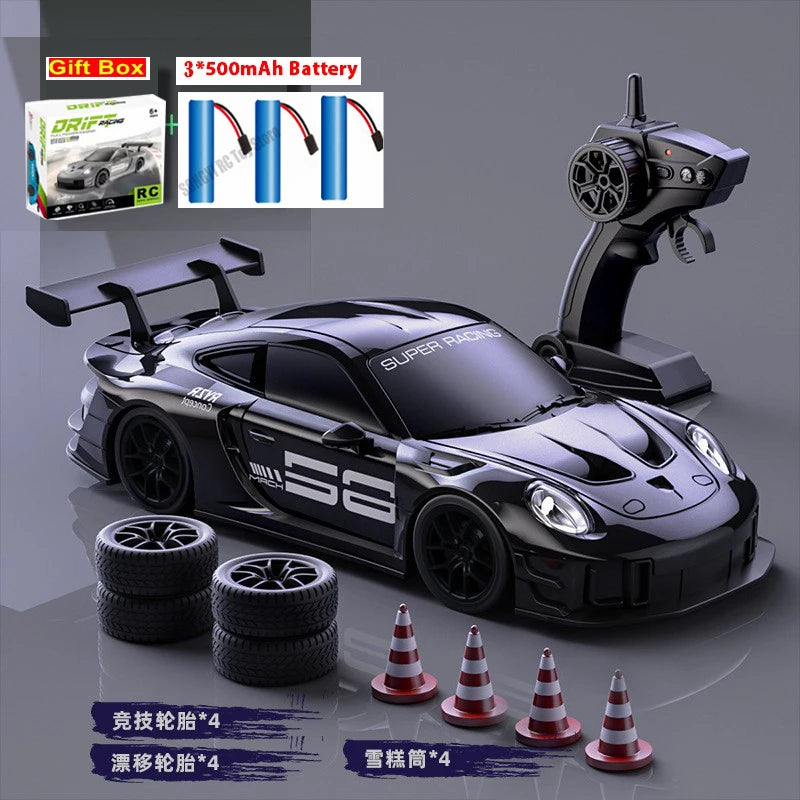 Coche RC de deriva 1:24 negro con control remoto, neumáticos y conos