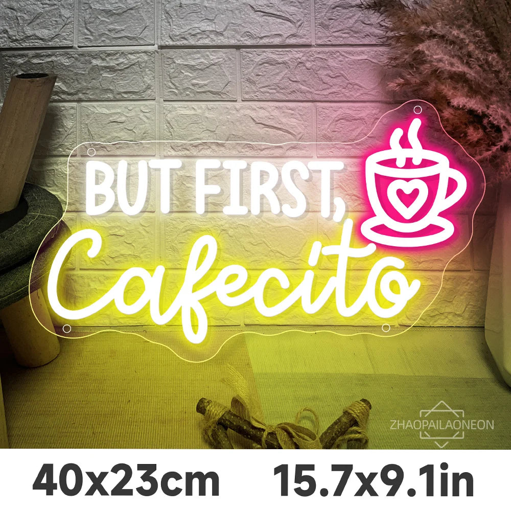Letrero LED de neón «But first, Cafecito»; taza y corazón en blanco, amarillo y rosa