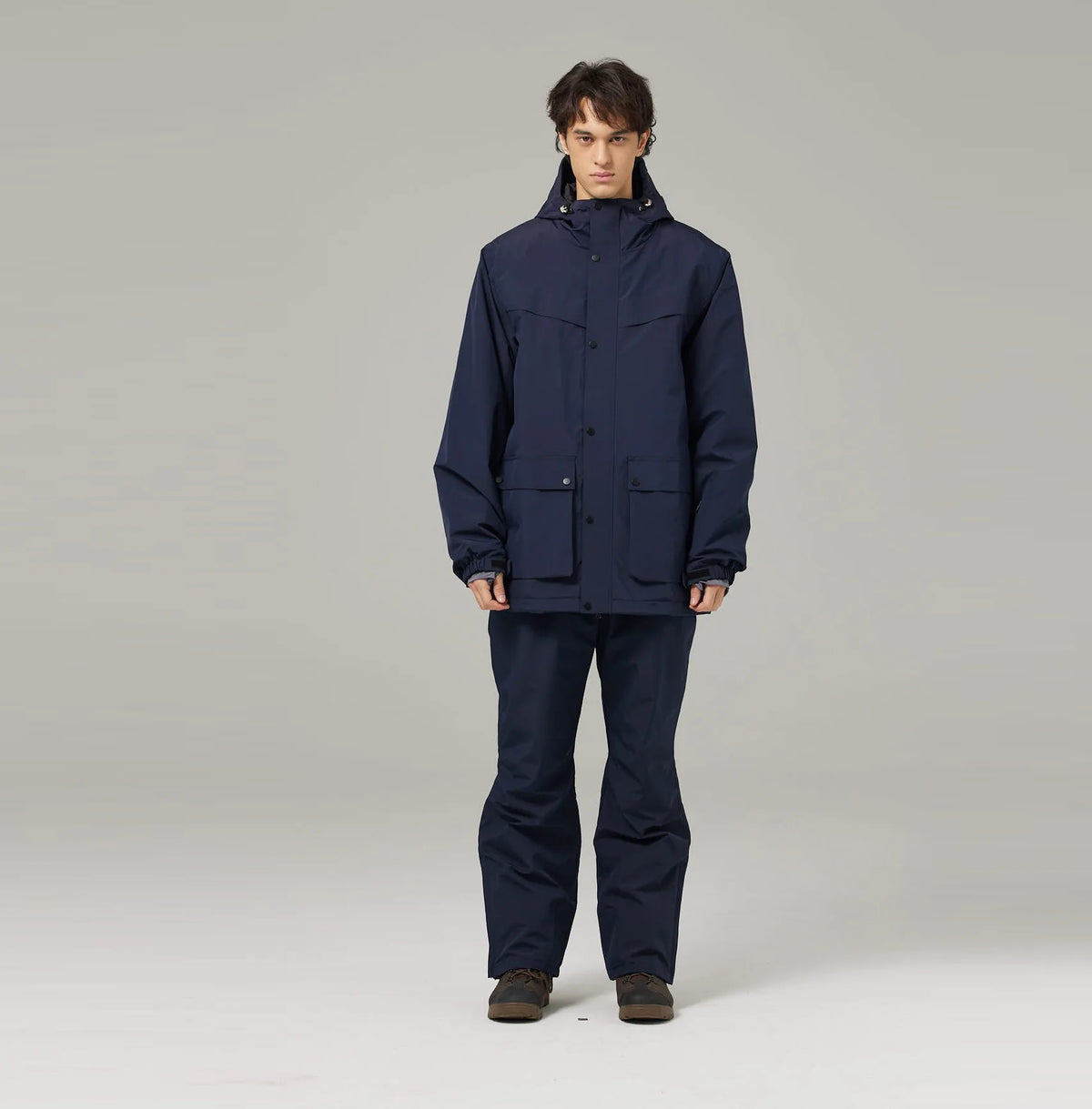 Mismos trajes de esquí de color sólido para hombres y mujeres, esquí de doble tabla y snowboard, versión súper suelta y de engorde al aire libre